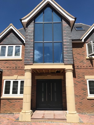 Full-height glazed gable on a new front elevation